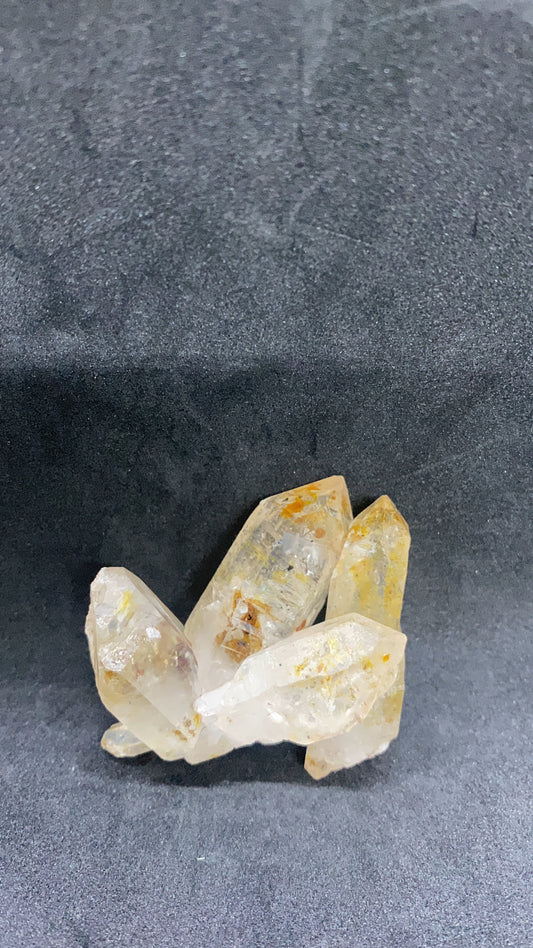 Rare Petroleum Quartz Specimen With A Family Of Points